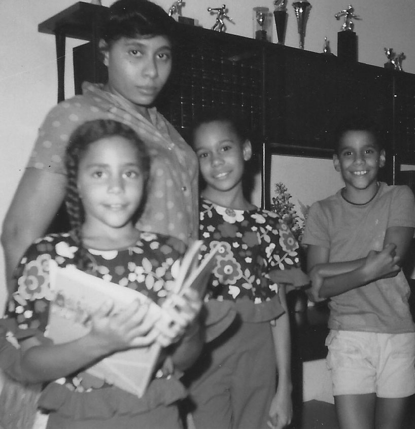 Ethel Louise Belton, with her children, Andreia, William and Brigitte (front).
